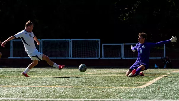 Jake Poole shooting at the Saint Joseph's goalkeeper