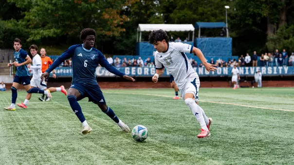 Yago Torres dribbling at a Rhode Island defender