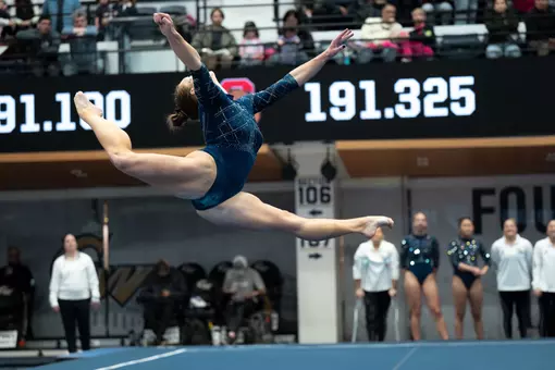 Deana Sheremeta performs on floor in the Smith Center
