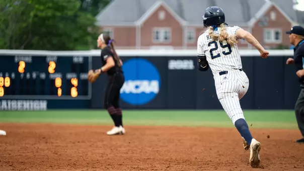 Paige Hayward running to second base