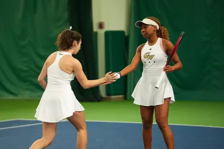 Solange Skeene and Viktoria Sasinka Celebrate a Win vs. Mount St. Mary's