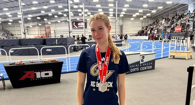 Sarah Mitchell Poses with her silver medal at the A-10 Championships