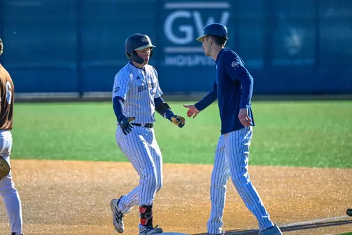 Robbie Lavey and Tanner Sinicki High-Five After a Hit vs. Lehigh