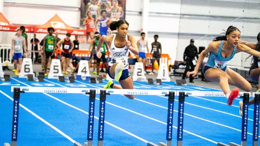 Kamryn Holness competes the 60m hurdles at the A-10 indoor championships
