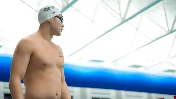 Preston Lin standing poolside at A-10s