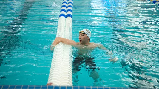 Daniel Choi hanging on the lane line