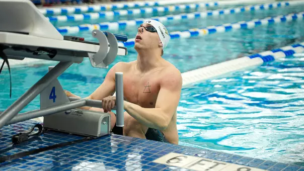 Holden Thomas on the backstroke starting block