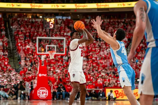 Terrance Arceneaux takes a shot for NC State vs. North Carolina