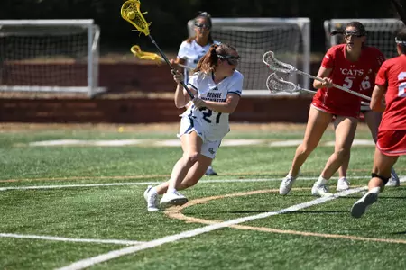 Grace Curry drives into the net at the Vern