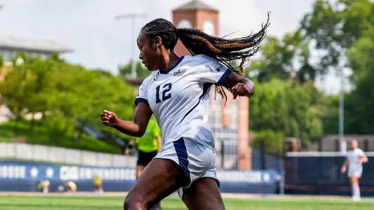 Sophia Michel dribbles the ball against Temple