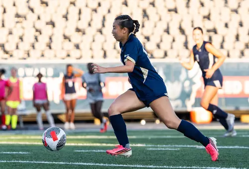 Kalia Kau Dribbles Up the Field at Howard