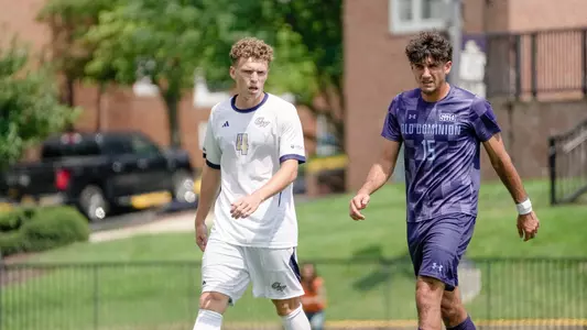 Colin Prendergast standing next to an ODU player