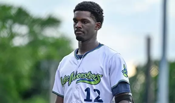 Masai Marshall Walks Up the Field During Summer Ball