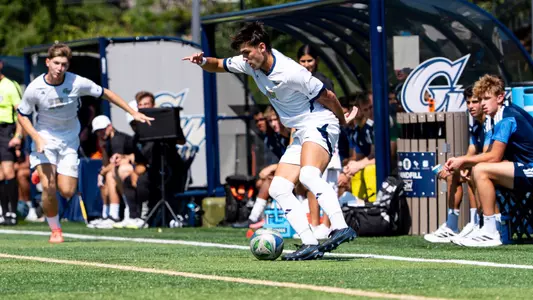 Webb Kosich dribbling at the GW Soccer Field