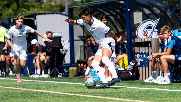 Webb Kosich dribbling at the GW Soccer Field