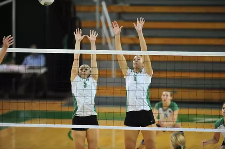 Bane (9) and Kiekover (6) going up for a block against UAB