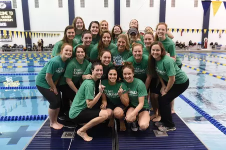 Ross (bottom left), poses with the team after a third place finish at the Zippy Invitational.