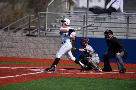 Sophomore Aaron Bossi carries a hot bat into the series