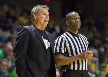 Marshall men's basketball coach Dan D'Antoni (left).