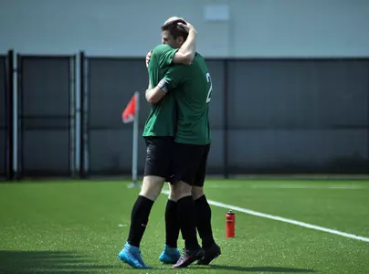 Seniors Trevor Starcher and Tommy Trupo celebrate after a goal at home.