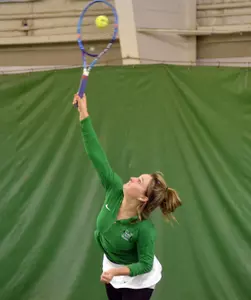Stephanie Smith won her singles match in a third-set tiebreaker. Smith also teamed up with Daniela Dankanych to win a doubles match.