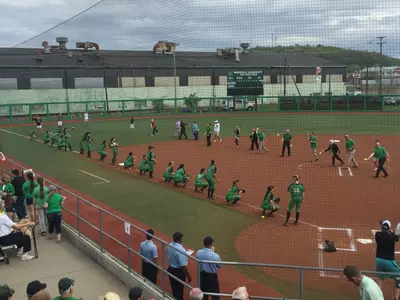 It was Staff Appreciation Day as all those who were recognized tossed out a group ceremonial first pitch.