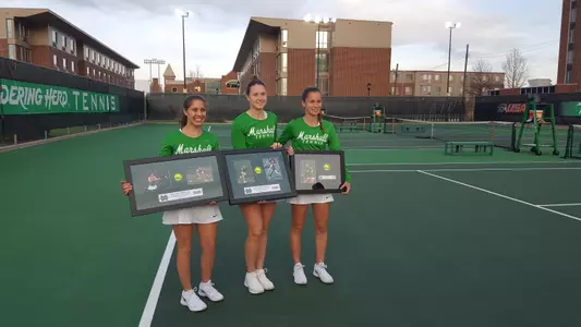 Seniors (L-R) Rachael Morales, Anna Pomyatinskaya and Derya Turhan were honored prior to the match against West Virginia State.