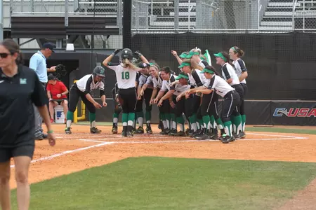 Marshall welcoming home senior Morgan Zerkle after her solo home run in the third.