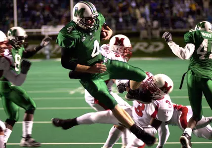 Stan Hill crosses the goal line for the go-ahead touchdown in a 36-34 win against Miami in 2002.