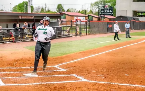 Freshman Aly Harrell scoring the lone run for Marshall on a bases loaded walk.