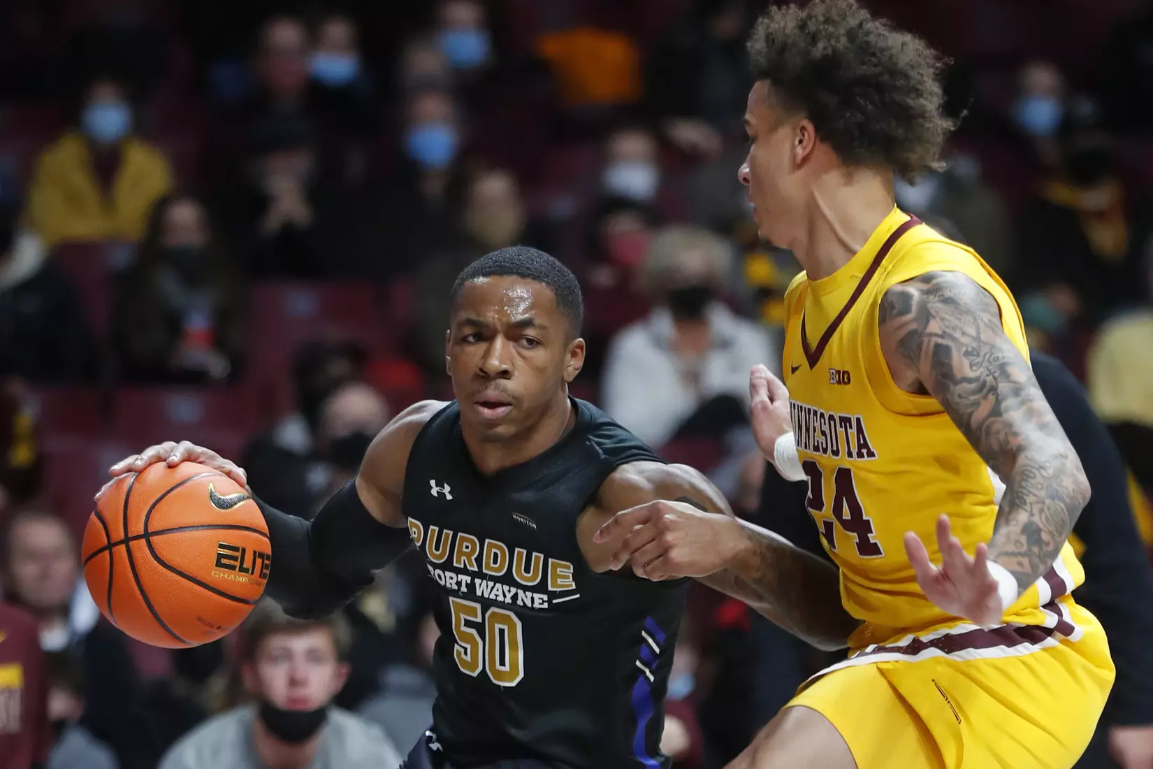 Jalon Pipkins (50), Eric Curry (24)
NCAA Basketball: Purdue Fort Wayne v Minnesota
©2021 Bruce Kluckhohn