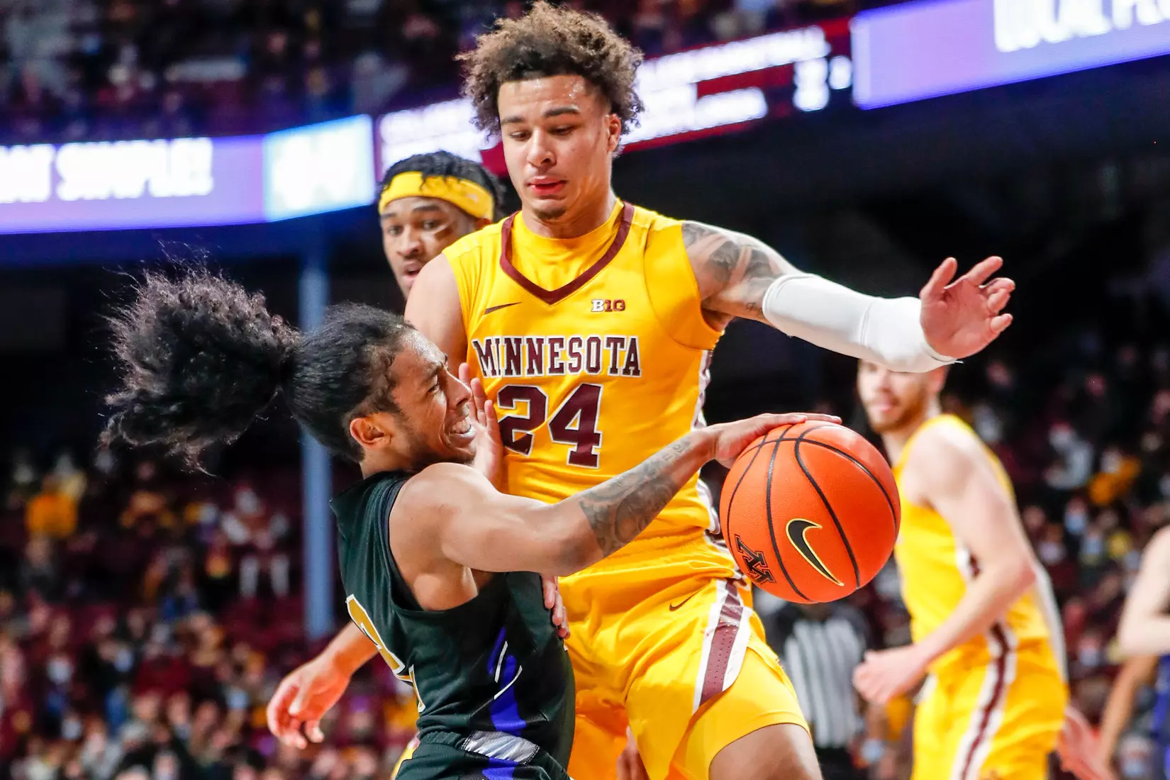 Damian Chong Qui (2), Sean Sutherlin (24)
NCAA Basketball: Purdue Fort Wayne v Minnesota
©2021 Bruce Kluckhohn