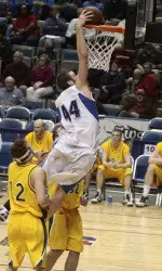 McCorkle's Career-Night, Yearby's Second-Half Lead 'Dons Past Bison Image