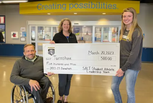 SALT presents a check to Turnstone