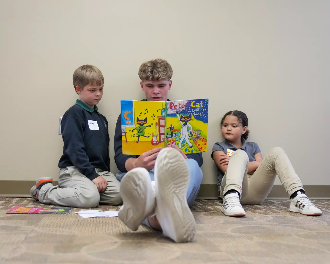 Reading to Holy Cross students
