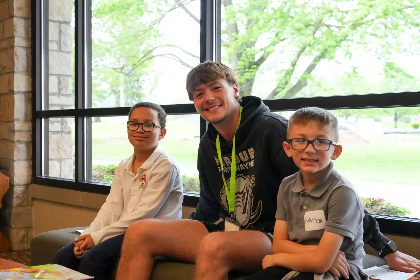Reading to Holy Cross students