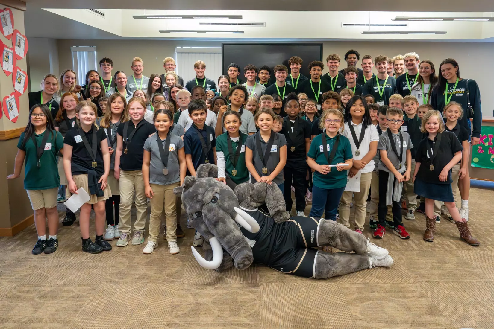 Reading to Holy Cross students