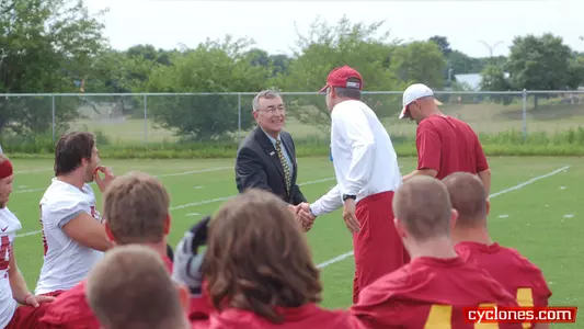 President Geoffroy Kicks Off First Football Practice