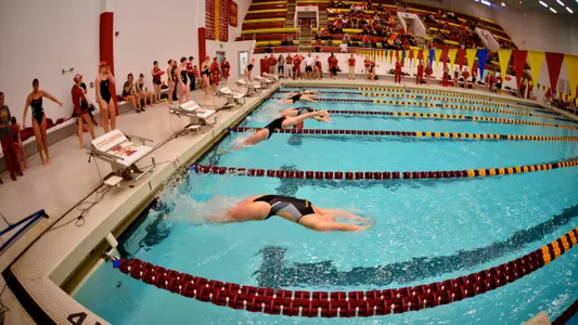 Gold Team Tops Cardinal, 112-105