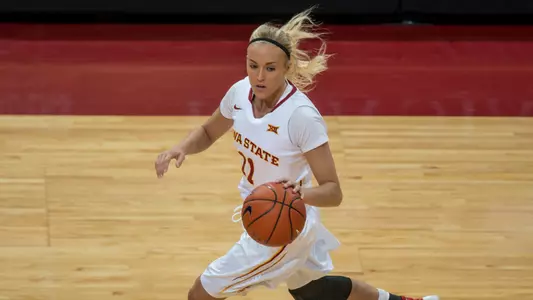 No. 6 Longhorns Outlast Cyclones, 65-49