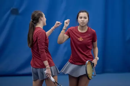 Maty Cancini and Regina Espindola celebrate after their match against Augustana.