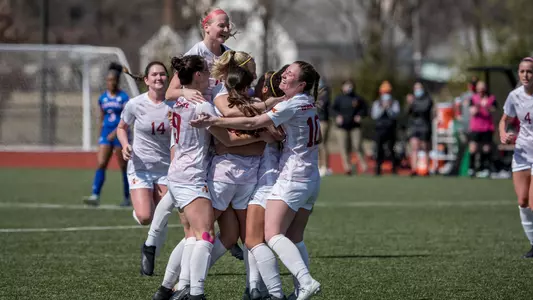 Soccer team celebration vs. Kansas