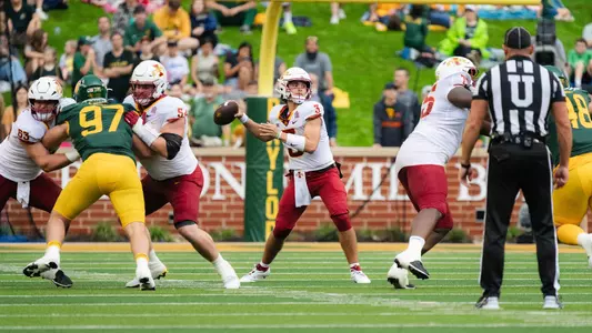 Rocco Becht throws a pass against Baylor.