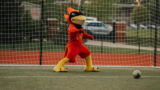 Cy playing goalie