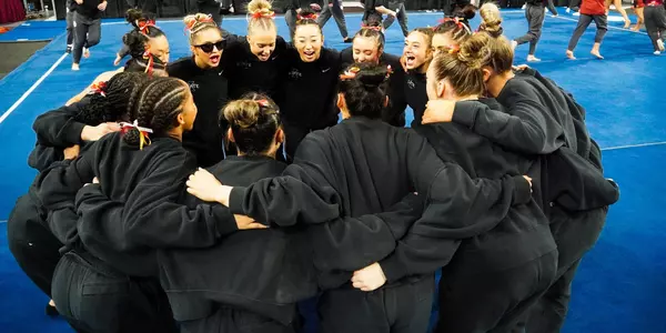 Gymnastics 2023 team huddle