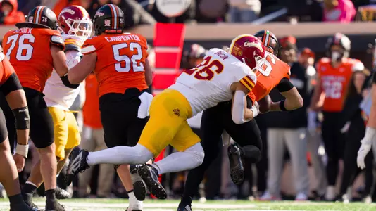 Caleb Bacon sacks the quarterback against Oklahoma State in 2025