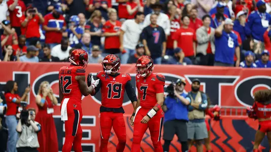 Xavier Hutchinson Celebrating a TD - Texans, 2026