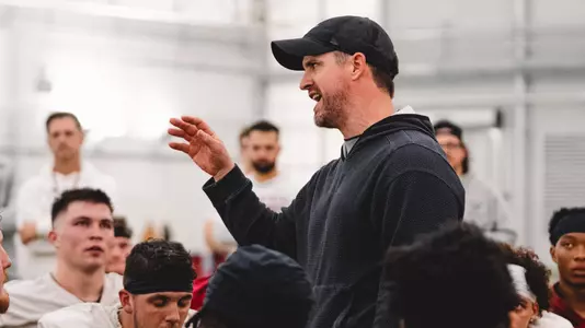 Iowa State head coach Jimmy Rogers speaks with the team after a spring practice