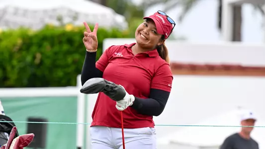 Nichakorn Pinprayoon gets ready to tee off at the NCAA Women's Golf Championships.