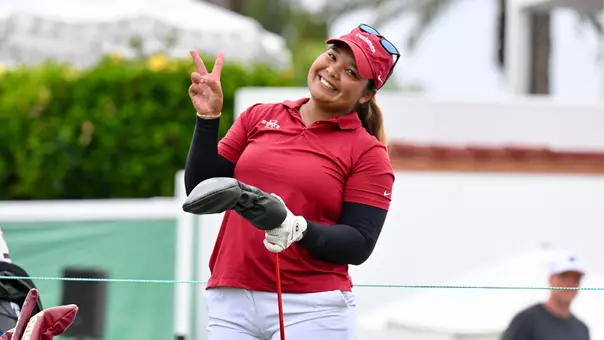 Nichakorn Pinprayoon gets ready to tee off at the NCAA Women's Golf Championships.